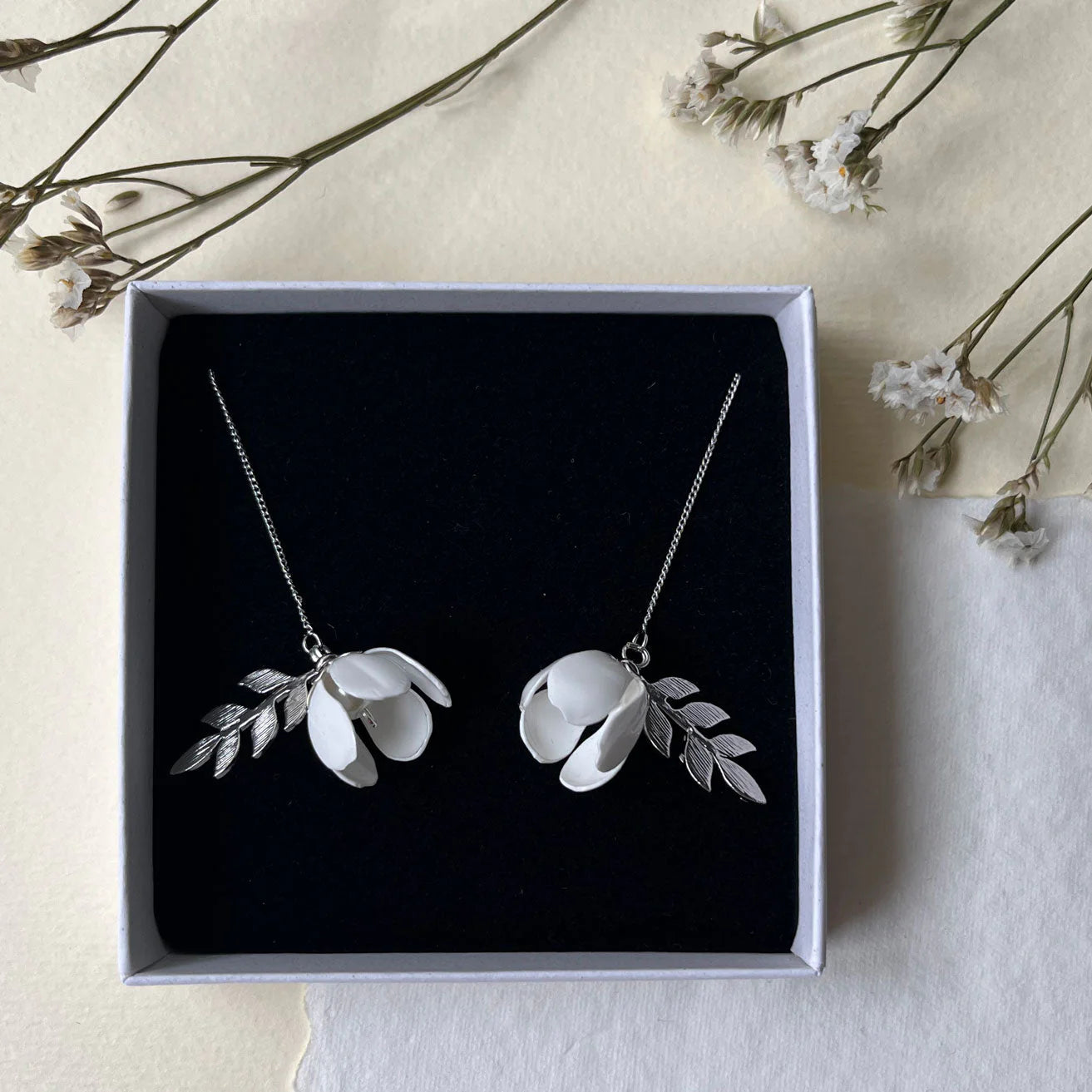 White flower adjustable earrings